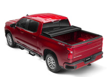 Carregar imagem no visualizador da galeria, Lund 04-15 Nissan Titan (6.7ft. Bed) Hard Fold Tonneau Cover - Black