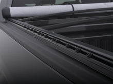 Load image into Gallery viewer, Lund 16-17 Nissan Titan XD (6.5ft. Bed w/Titan Box) Genesis Elite Snap Tonneau Cover - Black