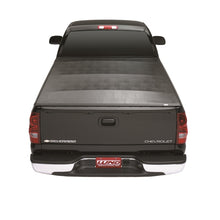 Load image into Gallery viewer, Lund 00-04 Dodge Dakota (5ft. Bed) Genesis Seal &amp; Peel Tonneau Cover - Black