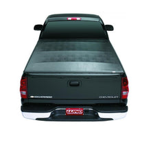 Load image into Gallery viewer, Lund 00-04 Dodge Dakota (5ft. Bed) Genesis Seal &amp; Peel Tonneau Cover - Black