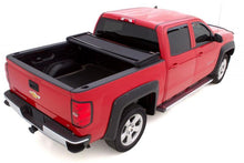 Carregar imagem no visualizador da galeria, Lund 02-17 Dodge Ram 1500 (6.5ft. Bed Excl. Rambox) Genesis Elite Tri-Fold Tonneau Cover - Black