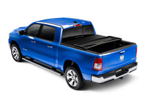 Load image into Gallery viewer, Lund 05-12 Dodge Dakota (6.5ft. Bed w/o Utility TRack) Genesis Elite Tri-Fold Tonneau Cover - Black