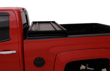 Carregar imagem no visualizador da galeria, Lund 04-15 Nissan Titan (6.7ft. Bed) Hard Fold Tonneau Cover - Black